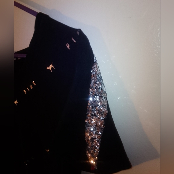 Pink shirt with sequin effect on the sleeves - Picture 2 of 2